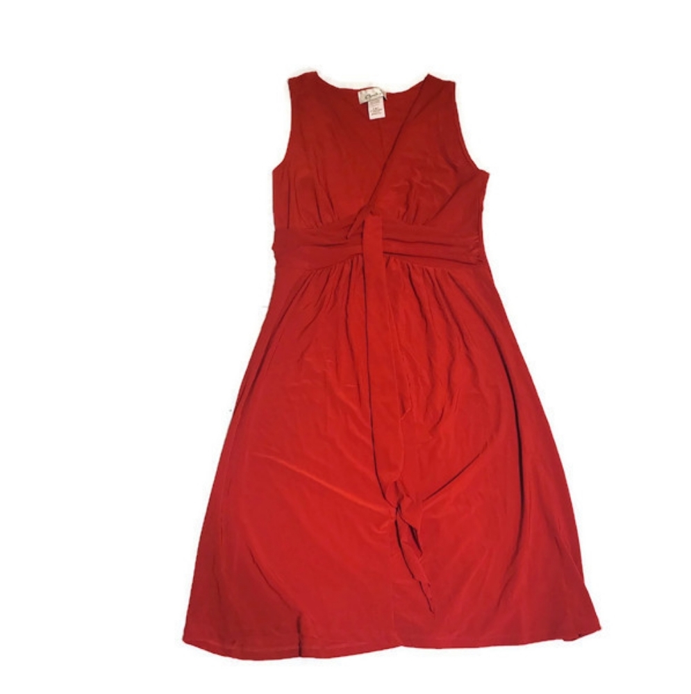 Chesley red dress. Drapes body shape.